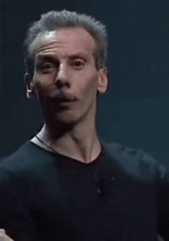 Gray-Haired Man Making Funny Face Raising Hand GIF