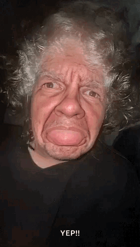 Gray Haired Man Sticking Out Tongue