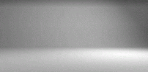 Gray Room With Floor and Wall Spotlights