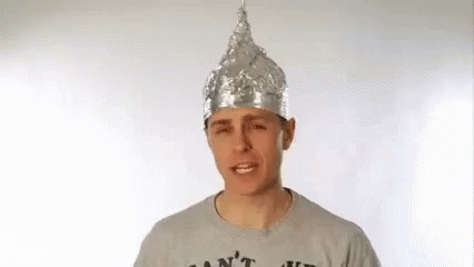 Gray Shirt Man Tin Foil Hat Making Face GIF