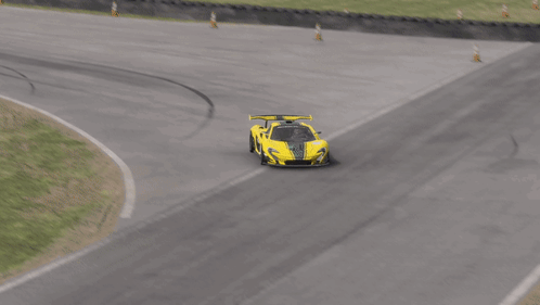 Gray Sports Car Driving