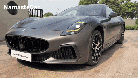Gray Sports Car With Namaste Logo GIF