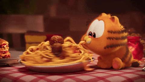 Greedy Cute Garfield Eating Plate Of Pasta GIF