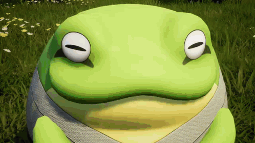 Green and Yellow Frog Sitting in Grass
