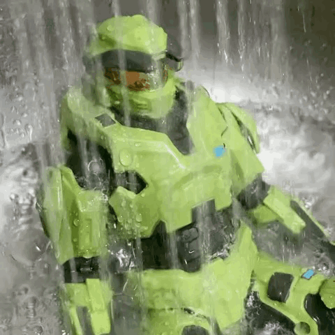 Green Armored Figure Sitting In Sink GIF