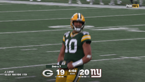 Green Bay Packers Player in Helmet and Mask