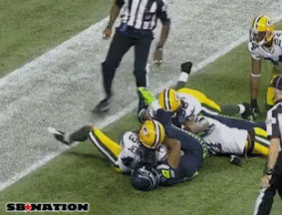Green Bay Packers Player Laying On Field GIF