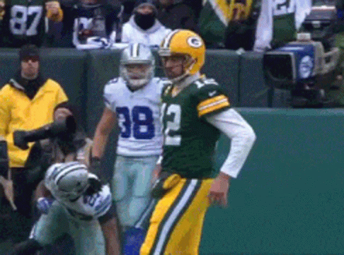 Green Bay Packers Player Number 12 Next to Player 38