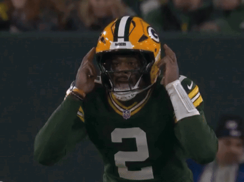 Green Bay Packers Player Number 2 Throwing Football