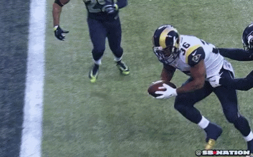 Green Bay Packers Player Number 2 Throwing Football