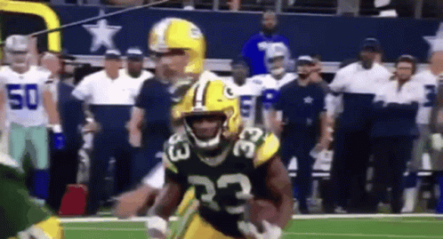 Green Bay Packers Player Running With Ball