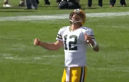 Green Bay Packers Player With Helmet and Sunglasses