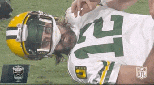 Green Bay Packers Player With Mask and Number 21