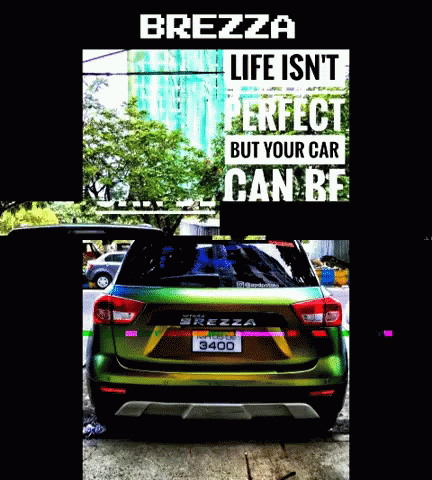 Green Car Parked in Front of Brezza Life Sign
