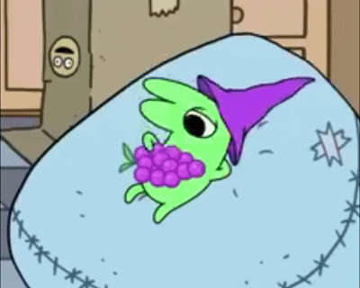 Green Cartoon Character In Purple Hat Eating Grapes GIF