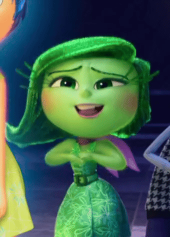 Green Cartoon Character with Purple Scarf Smiling