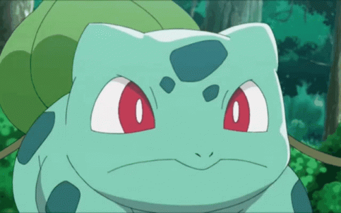 Green Cartoon Character With Red Eyes And Leaf On Back GIF