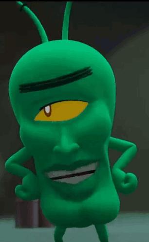 Green Cartoon Character With Yellow Eye Smiling