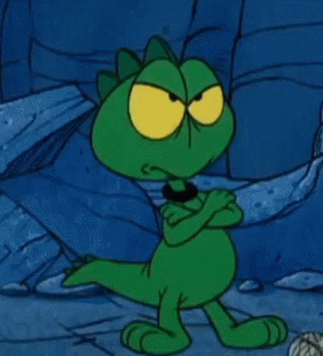 Green Cartoon Character with Yellow Eyes Arms Crossed