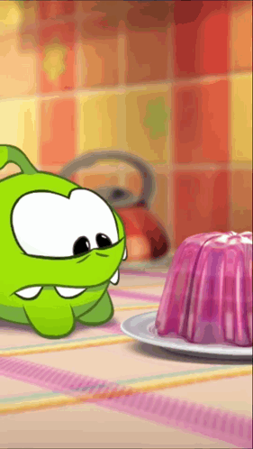 Green Cartoon Looking At Purple Pudding GIF