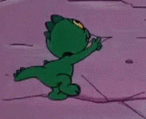 Green Cartoon Pointing On Pink Surface GIF