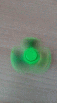 Green Fidget Toy Spinning GIF