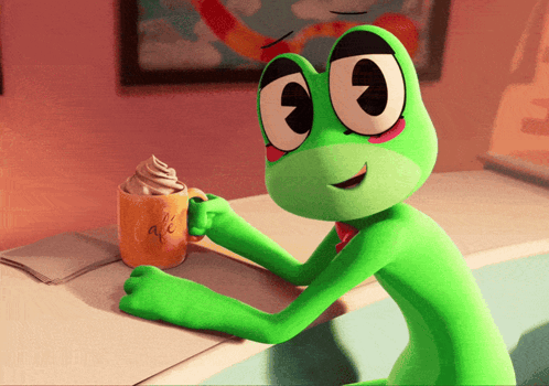 Green Frog Holding Cup of Coffee With Whipped Cream