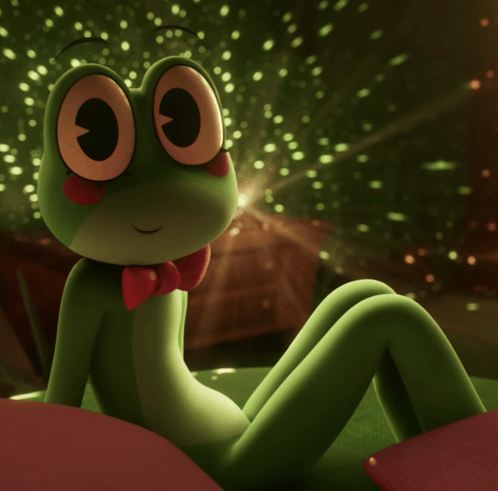 Green Frog in Red Bow Tie on Red Pillow