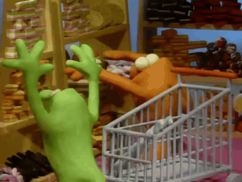 Green Frog Reaching for Something in Store