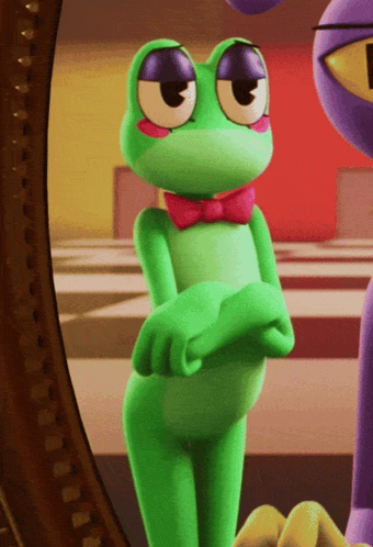 Green Frog With Purple Eyes and Pink Bow Tie in Front of Mirror
