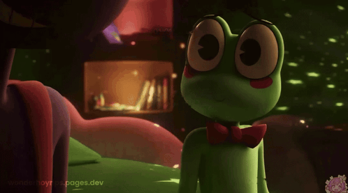 Green Frog With Red Bow Tie on Bed