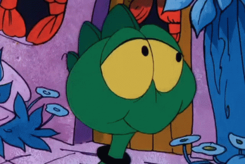 Green Frog With Yellow Eyes GIF