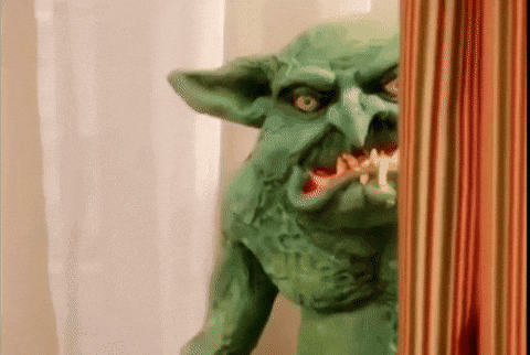 Green Goblin Statue with Toothbrush