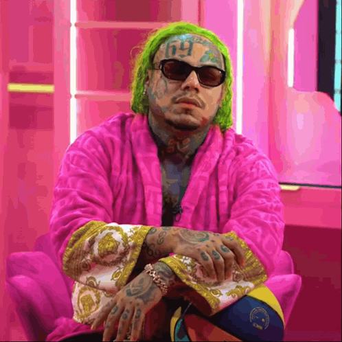 Green-Haired Man With Sunglasses and Number 69
