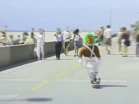 Green Haired Skateboarding Oompa Loompa GIF