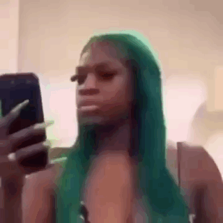 Green-Haired Woman Taking Selfie
