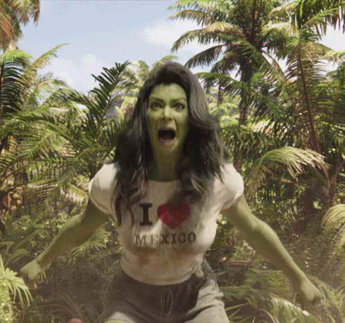 Green-Haired Woman Wearing I Heart Mexico Shirt GIF