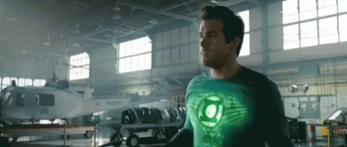 Green Lantern Costume Man In Hangar With Helicopter GIF