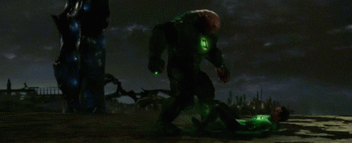 Green Lantern Standing Next To Man In Green Suit GIF
