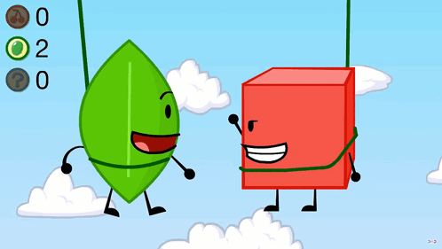 Green Leaf and Red Cube Side by Side