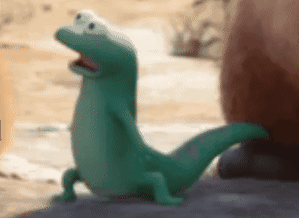 Green Lizard Standing on Rock