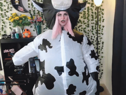 Green Mascot In Number 1 Shirt Dancing On Baseball Field GIF