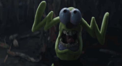 Green Monster With Blue Eyes Making Wow Sign GIF