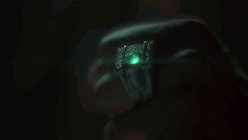 Green Object Glowing In The Dark GIF