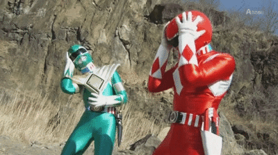 Green Ranger and Red Ranger on Rocky Hillside