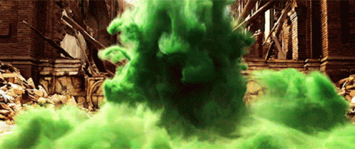 Green Smoke Coming Out Of A Building With A Brick Wall Behind It GIF