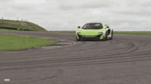 Green Sports Car Driving