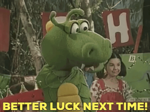 Green Stuffed Animal Saying Better Luck Next Time