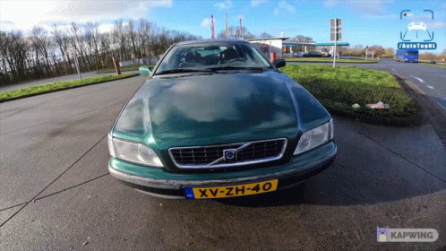 Green Volvo With License Plate XV-ZH-40 GIF