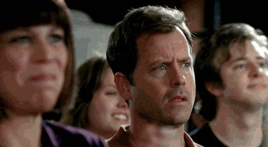 Greg Kinnear Not Funny Reaction Within The Crowd GIF